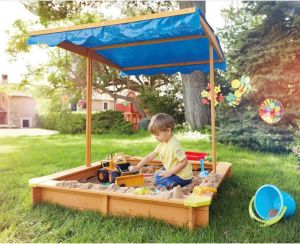 Children's sandbox with adjustable cover